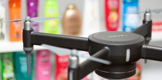 A Shelfie drone scanning shelves