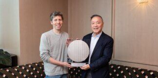 Sam Altman with Broadcom CEO Hock E. Tan and Wafer